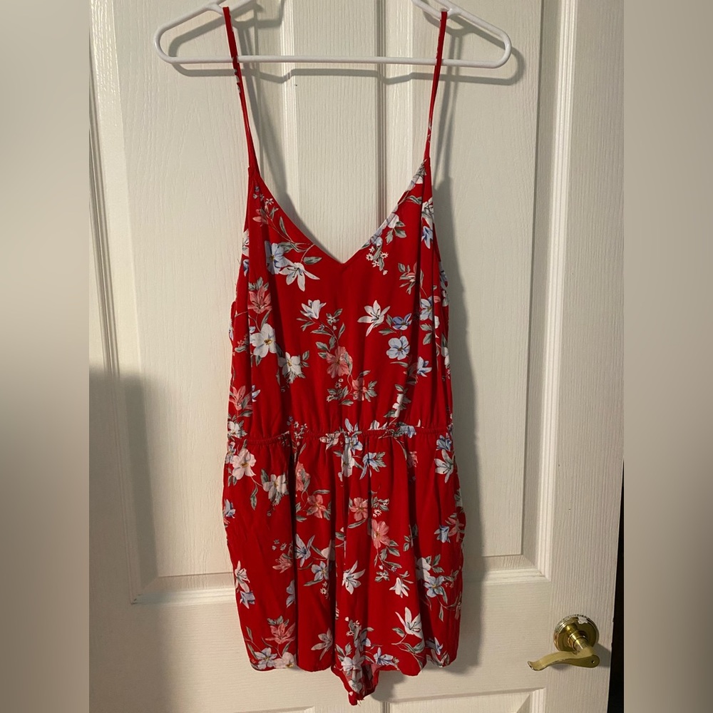 Flower print romper from H&M. UK size 14.